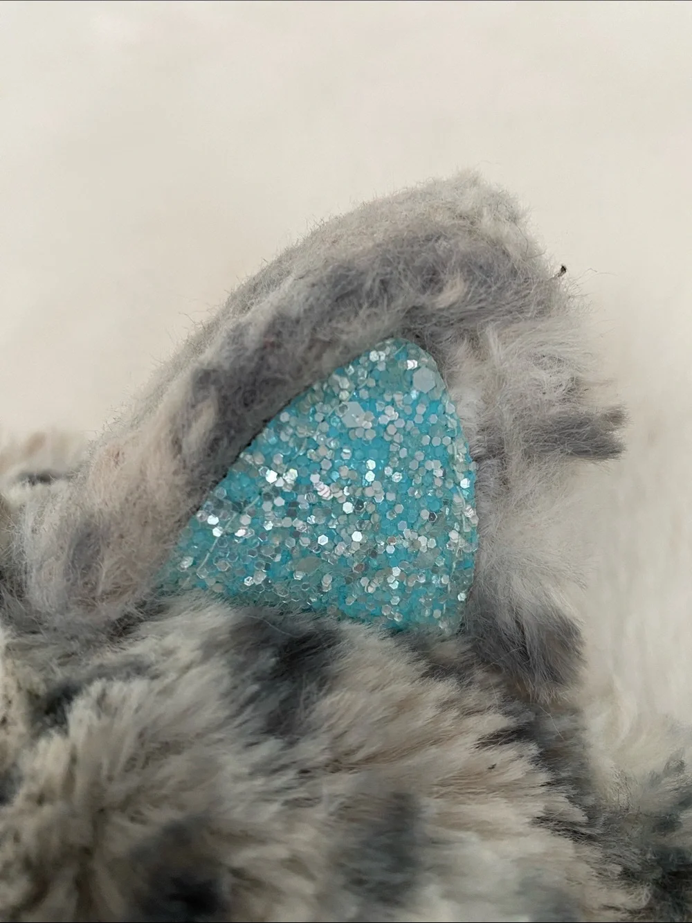 Justice Faux Fur Animal Ear Hat with Aqua Lining and Glitter 'K'